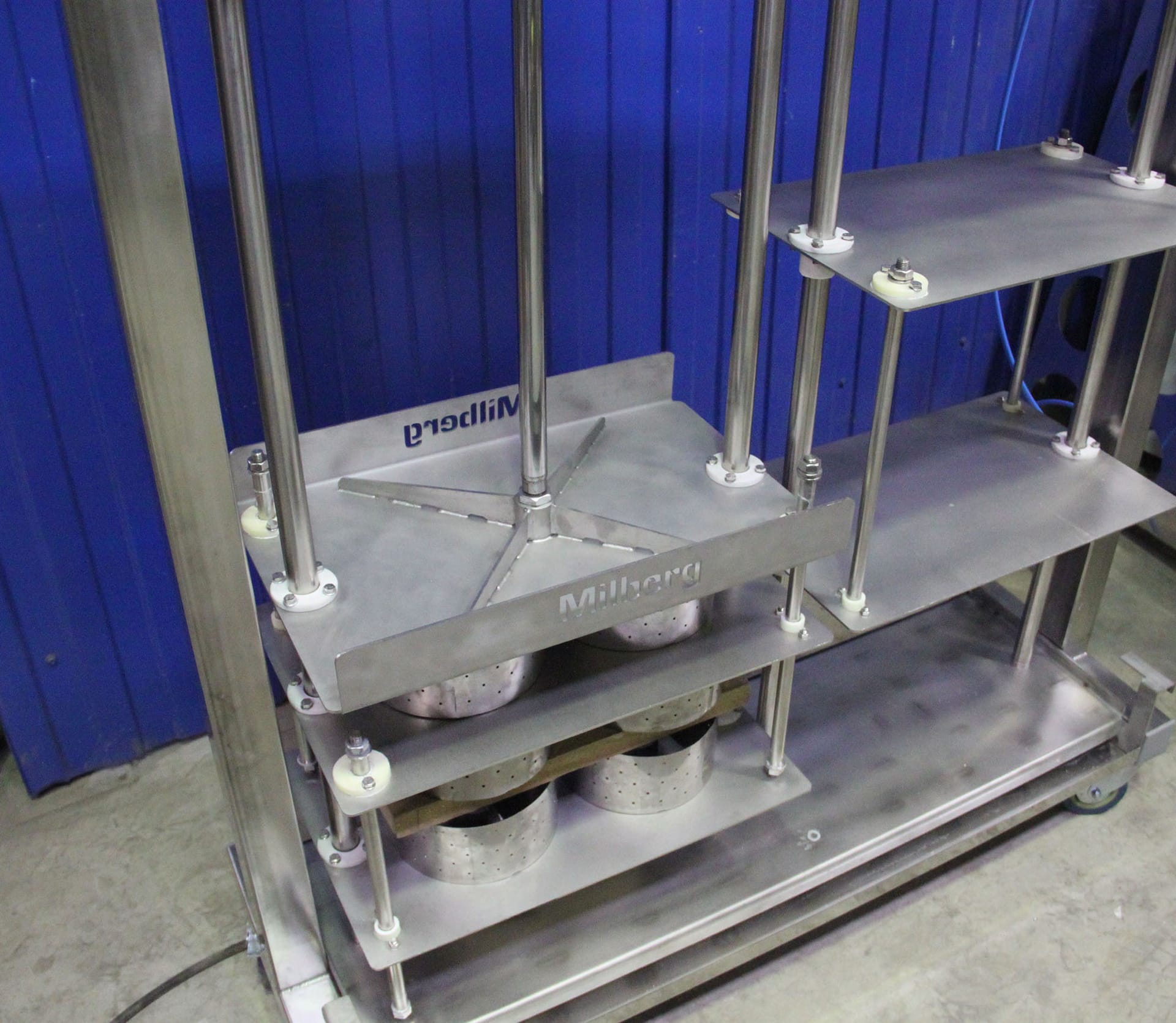 Shelves of the cheese press